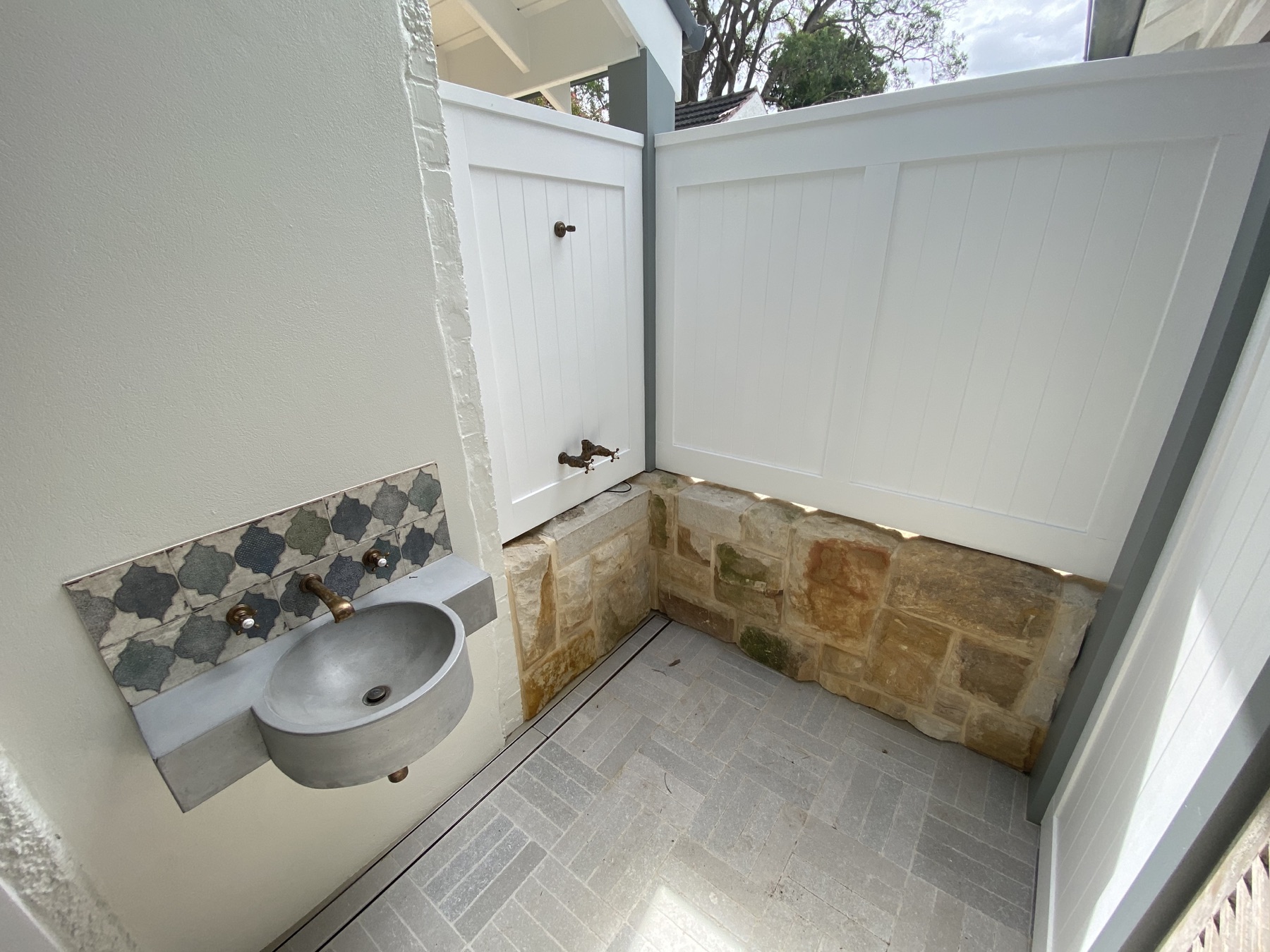 Outdoor utility wall finish
